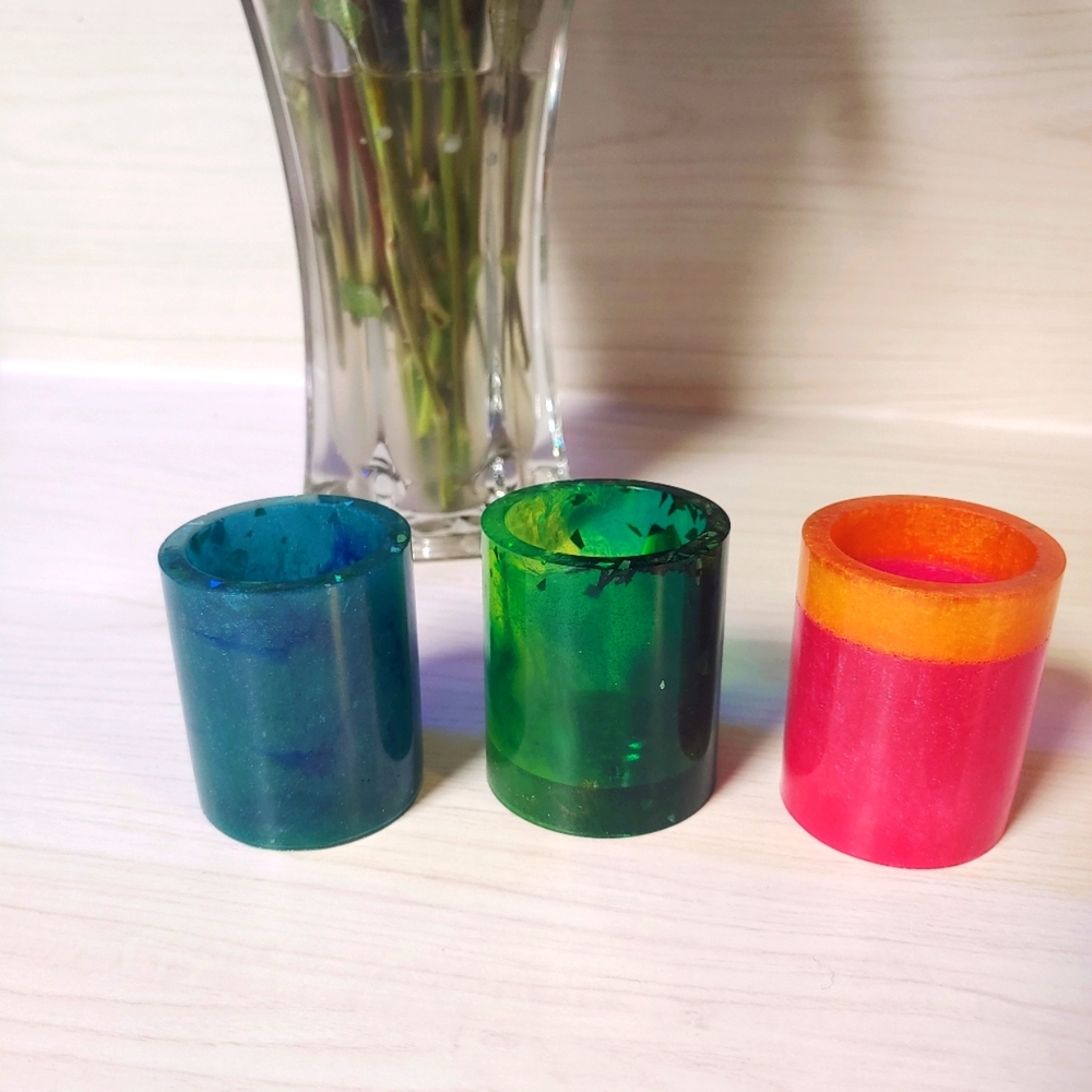 Q tip holders or shot glasses.